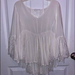 white flowy blouse